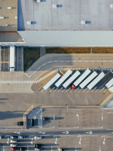 aerial view of vehicles in parking area